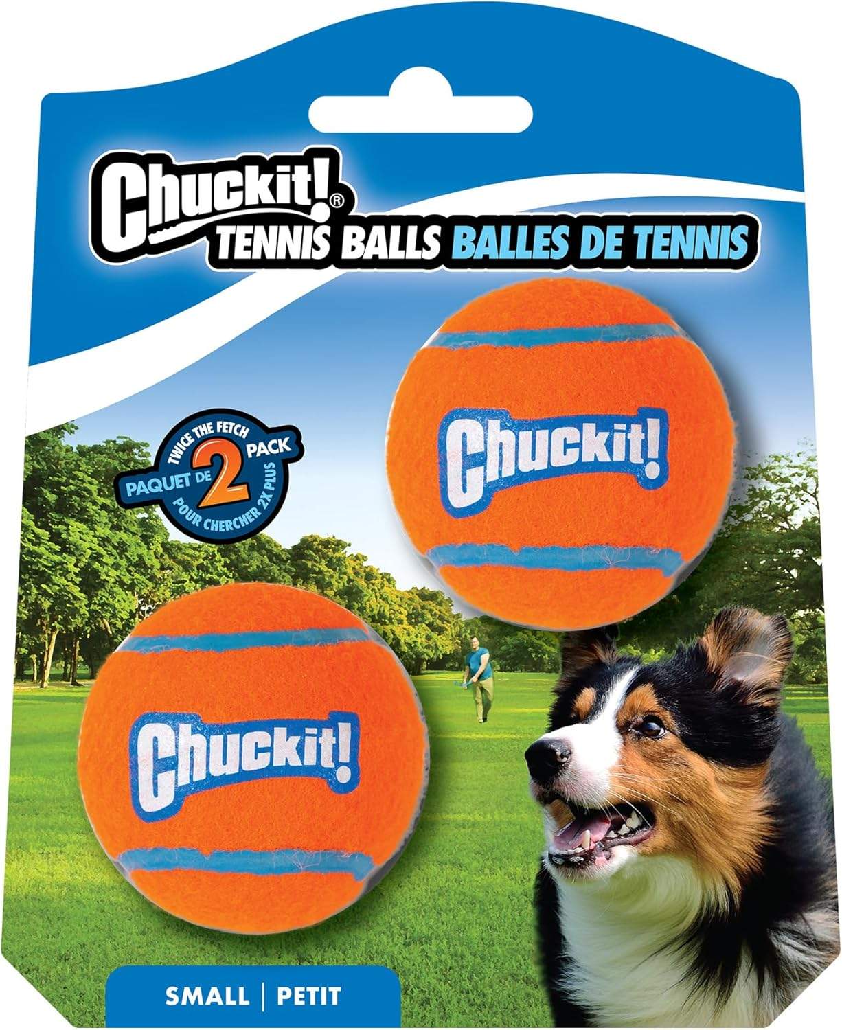 Piłki Chuckit w trzech kolorach na trawie